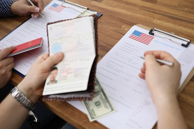Premium Photo People Filling Visa Application Forms With Personal 